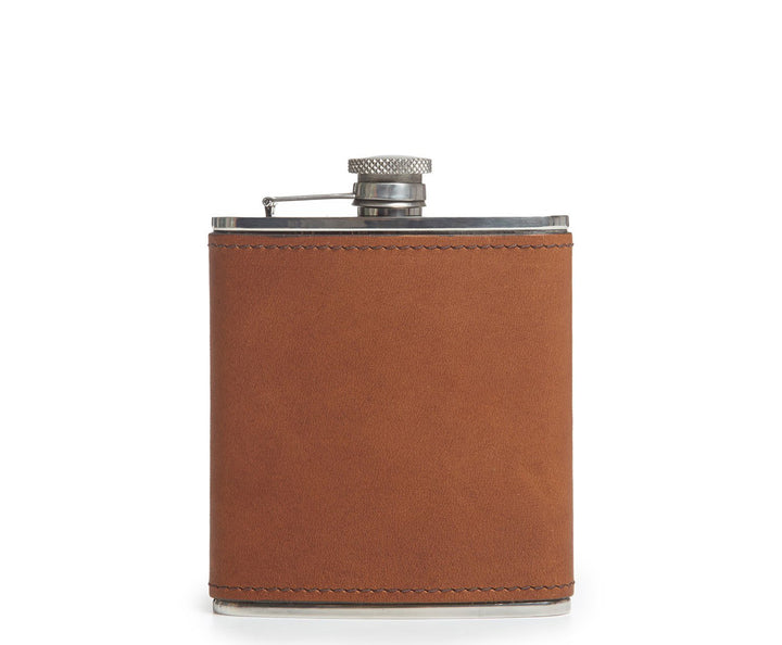 Espresso Leather hip flask Keep your libations ready to access on the go with the Arlo stainless steel flask. The Arlo is wrapped in full-grain American leather and includes a steel flask funnel. #color_espresso
