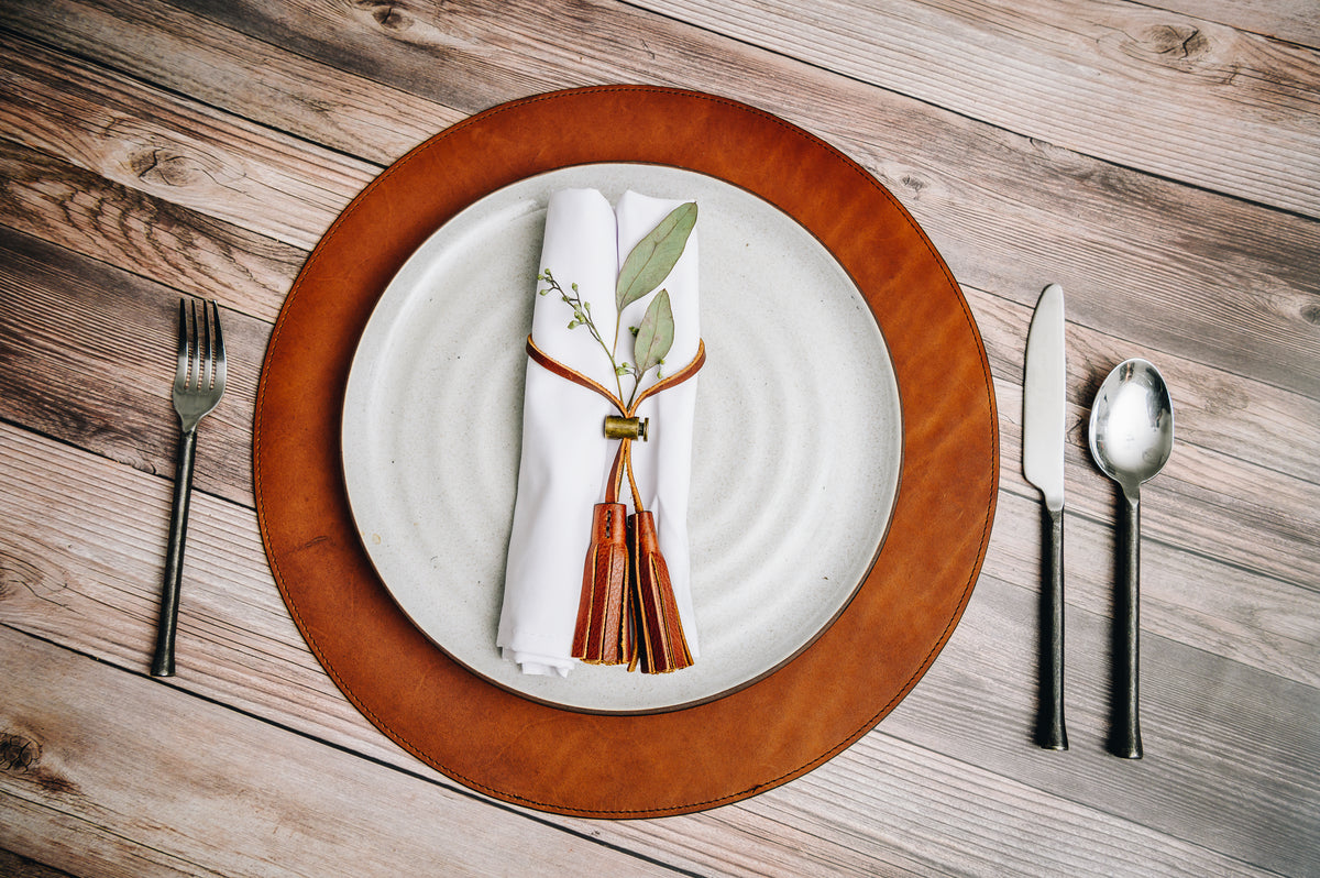 Full-grain American leather Backed with non-skid durable rubber mat Each placemat's selection is one-of-a-kind and slightly unique given the natural characteristics of the leather #color_espresso