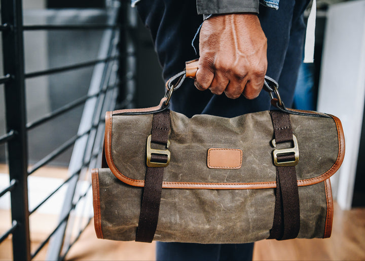 Give your tools a stylish and secure home with the Ramsey waxed canvas tool roll. Handcrafted with 8.25 oz waxed canvas, the Ramsey tool kit features 18 slip pockets of varying size, and a large zipped pocket for organizing small items.