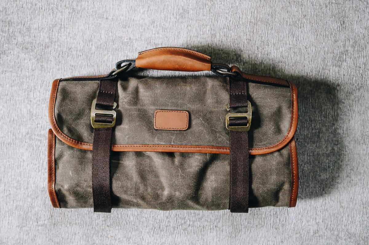 Handcrafted with durable, water resistant 8.25 oz. waxed canvas Features 18 slip pockets designed to store various tools One large zipped pockets designed to secure small items such as sockets, screws, etc