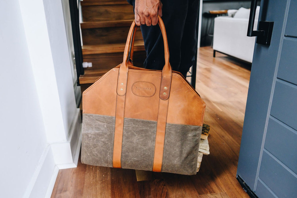 8.25 oz water-resistant waxed canvas Full-grain American leather accents 8" handle drop with handle keeper / stay Handcrafted with care in our own factory Dimensions: 43" L x 19.5" W #color_olive