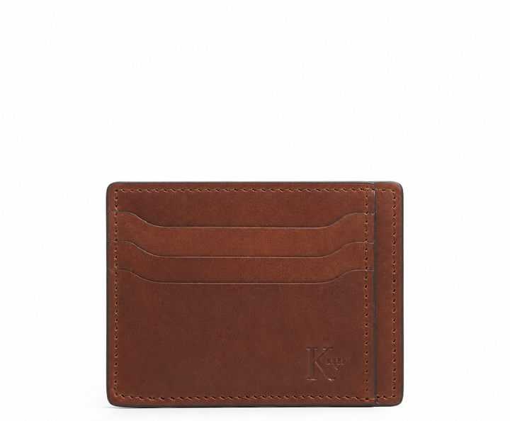 Espresso Slim leather wallet Handcrafted with full-grain vegetable tanned leather, this slim wallet is designed with simplicity and functionality in mind. Made to slip easily into back pockets, the Knox has six scalloped credit card slots and two vertical stash pockets. #color_espresso