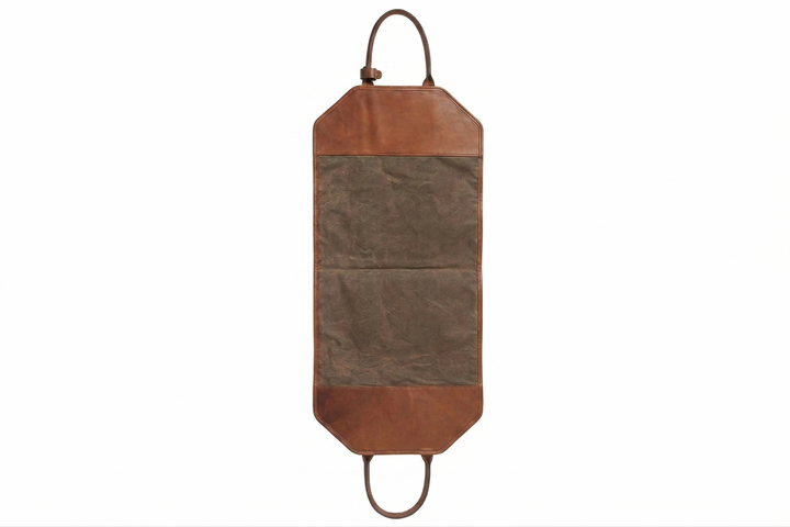 Olive 8.25 oz water-resistant waxed canvas Full-grain American leather accents 8" handle drop with handle keeper / stay Handcrafted with care in our own factory Dimensions: 43" L x 19.5" W #color_olive