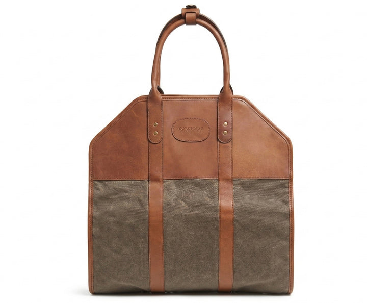 Olive Waxed canvas log carrier Carry logs from the wood pile into your home in style and with ease using the Rayburn waxed canvas log carrier. The Rayburn is expertly constructed with multiple layers of 8.25 oz waxed canvas and is trimmed in full-grain American leather. 