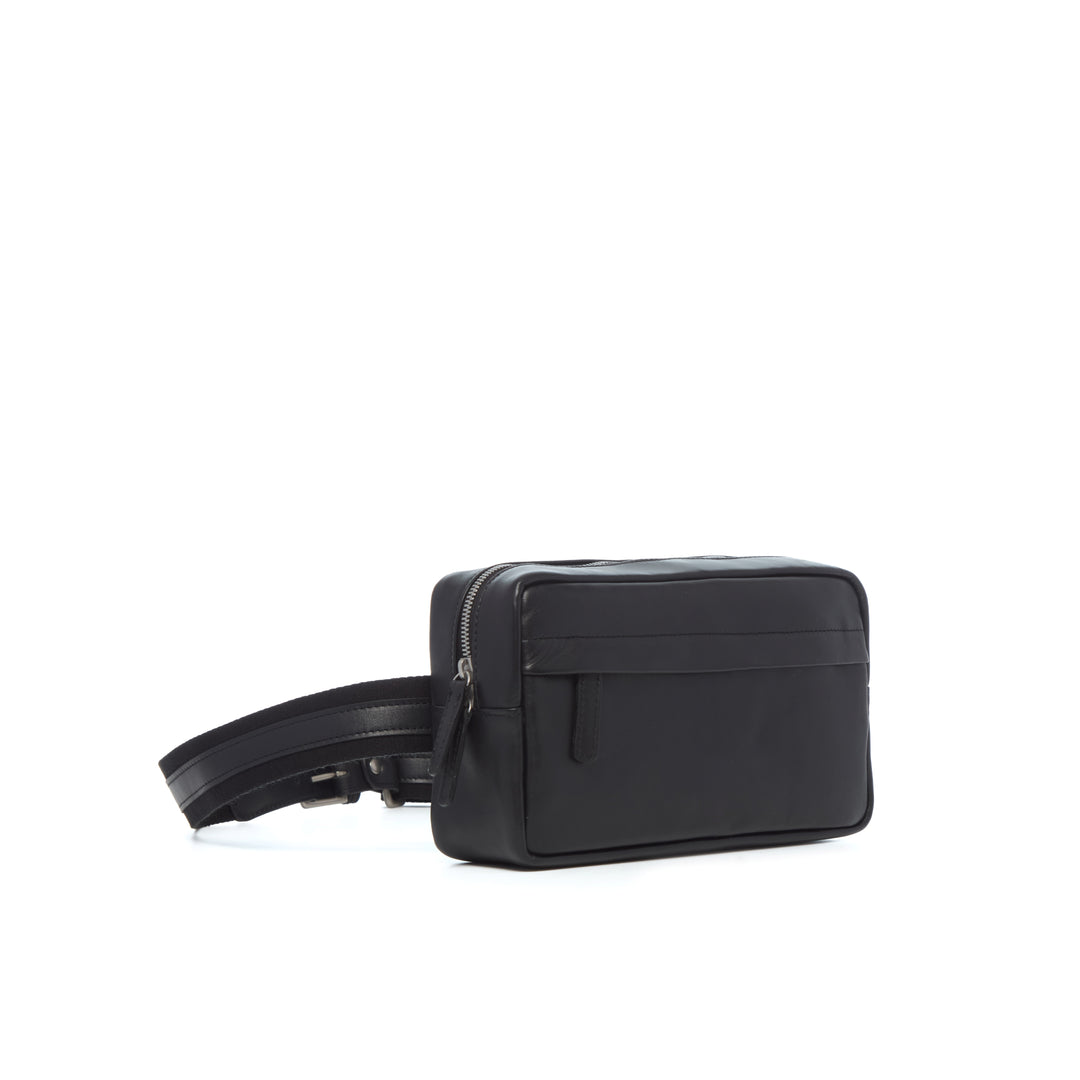 Mercer full-grain leather sling bag in Black three-quarter view
