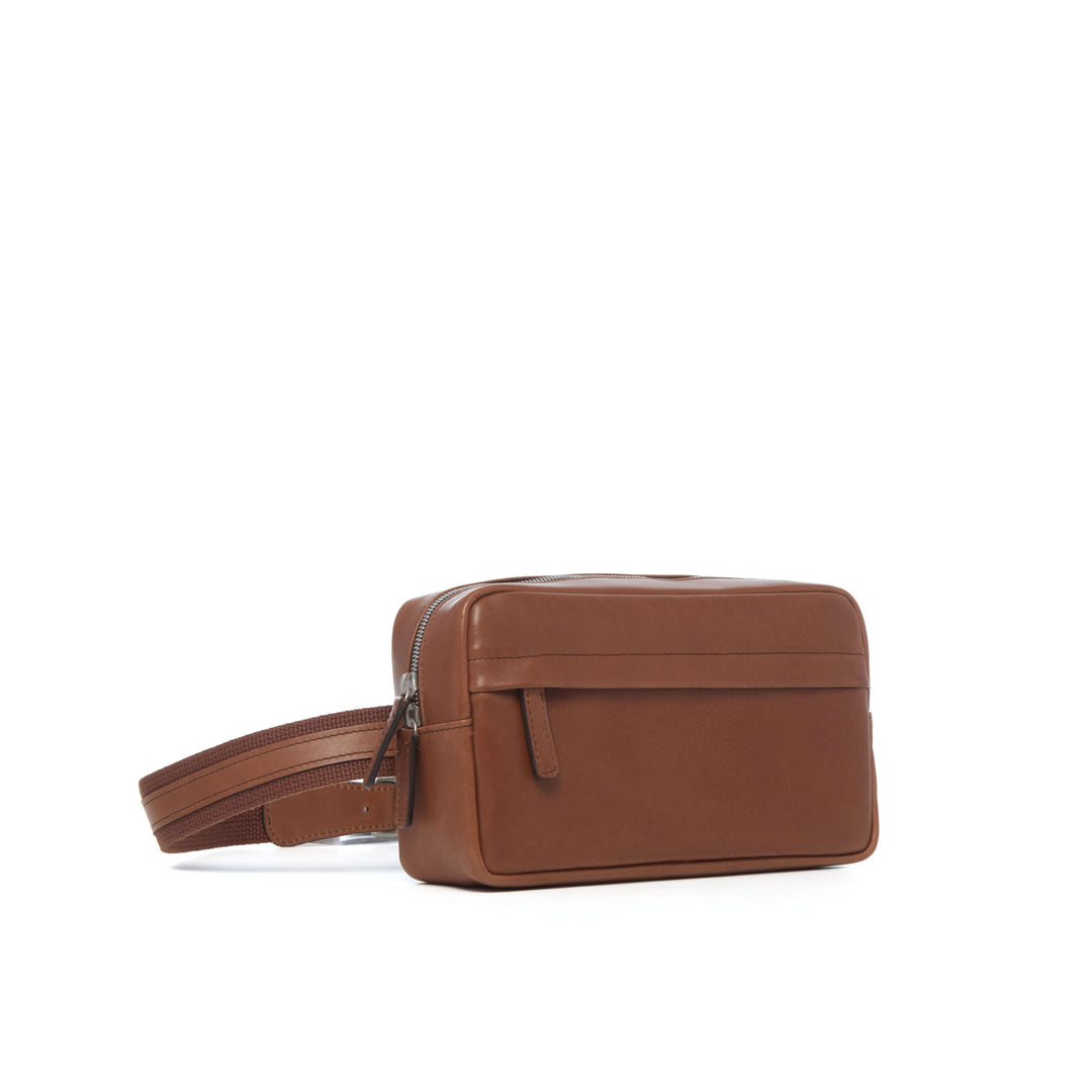Mercer full-grain leather sling bag in Brown three-quarter view