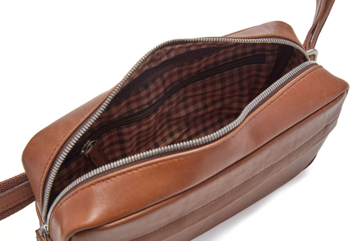 Mercer Leather Sling in Brown interior with plaid lining and zippered pocket