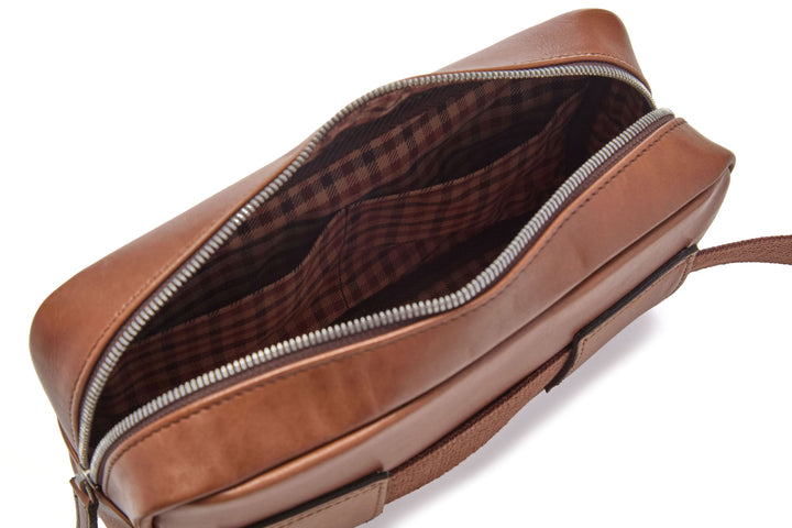 Mercer Leather Sling in Brown interior with plaid lining and slip pocket