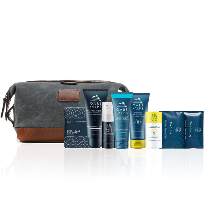 Grey Waxed Canvas Dopp Kit The Ryder is a compact waxed canvas toiletry bag with full grain leather trim. This Dopp Kit features a top zipper and snap down ends that allow for maximum expansion. #color_grey