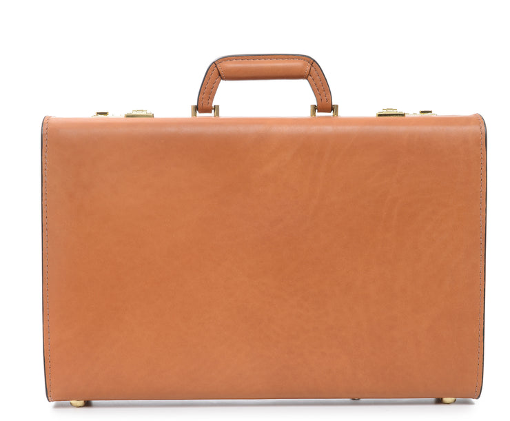 Tan Leather Attaché Case A true classic, the Monroe is a full grain American leather attache case. Handcrafted with the widely regarded piano hinge construction technique, and featuring a secure combination locking system, the Monroe stylishly protects confidential files and can accommodate most 17" laptops.