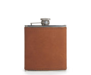 Espresso Leather hip flask Keep your libations ready to access on the go with the Arlo stainless steel flask. The Arlo is wrapped in full-grain American leather and includes a steel flask funnel.