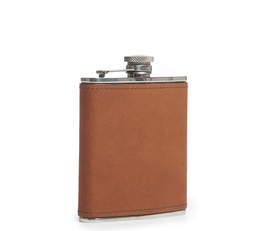 Espresso Hover Full-grain American leather 6 oz capacity Handcrafted with care in our own factory  Includes stainless steel flask funnel Dimensions: 5" L x 4.5" W
