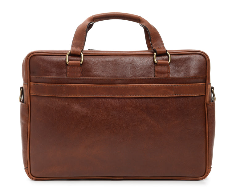 Chocolate Leather Laptop Briefcase Handcrafted with full grain milled pebble grain leather, and trimmed with oil-tanned saddle leather, the Barton is a streamlined professional briefcase that features two generous front pockets, and that is designed to accommodate most 15" laptops.
