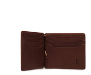 Brown Handcrafted with American full-grain vegetable tanned leather One full length bill pocket with leather lined back 6 credit card slots with scalloped shape for easy card recognition 2 vertical stash pockets All edges are hand burnished and inked Dimensions: 3.25" x .5" x 4.5"