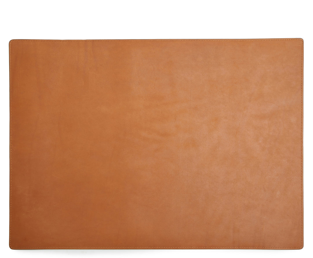 Tan Leather desk pad Handcrafted with American full-grain leather, the Carter leather desk pad adds a sophisticated touch to your work-from-home setup while protecting your desk's surface from scratches. #color_tan