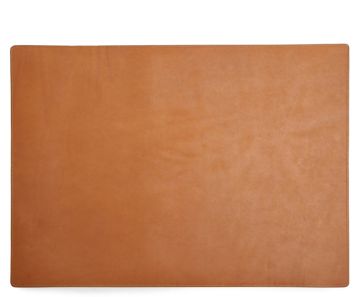 Tan Leather desk pad Handcrafted with American full-grain leather, the Carter leather desk pad adds a sophisticated touch to your work-from-home setup while protecting your desk's surface from scratches.