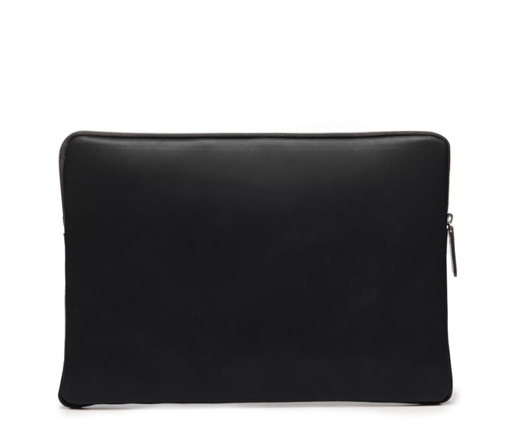 Black Full grain American leather Padded construction designed to protect most 14" laptops and some 15" Lined interior 15" Leather Laptop Sleeve Dimensions: 13.5" x 2" x 10" #color_black