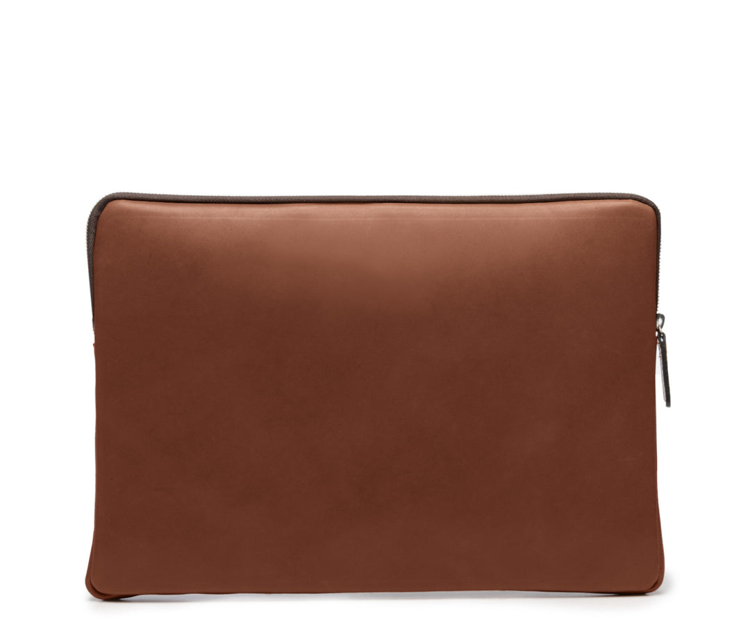 Brown Full grain American leather Padded construction designed to protect most 14" laptops and some 15" Lined interior 15" Leather Laptop Sleeve Dimensions: 13.5" x 2" x 10" #color_brown