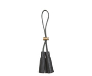 Black Leather tassel keeper Add texture to your décor and get creative with the Cooper leather tassel keepers. Perfect for use as napkin holders, on curtains or doorknobs, as carry-on bag identifiers, and so much more. The Cooper leather tassel keepers are handcrafted with full-grain American leather.
