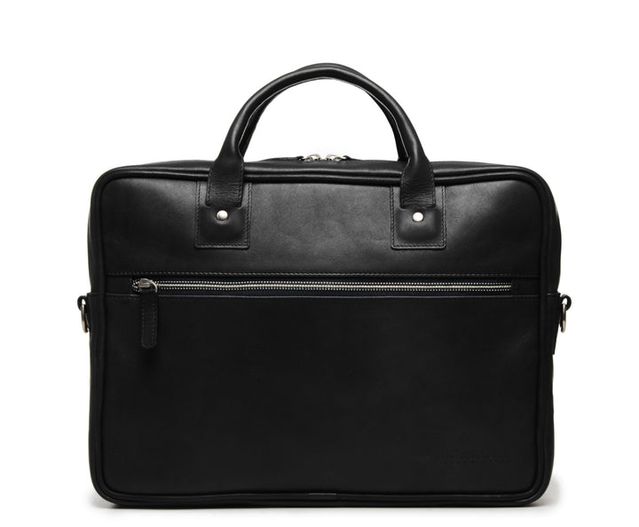 Black Slim Leather Briefcase The Edwin leather briefcase features a removable, adjustable shoulder strap and built-in laptop sleeve. It is designed with a secure top zipper, and can safely accommodate most 13" laptops. #color_black