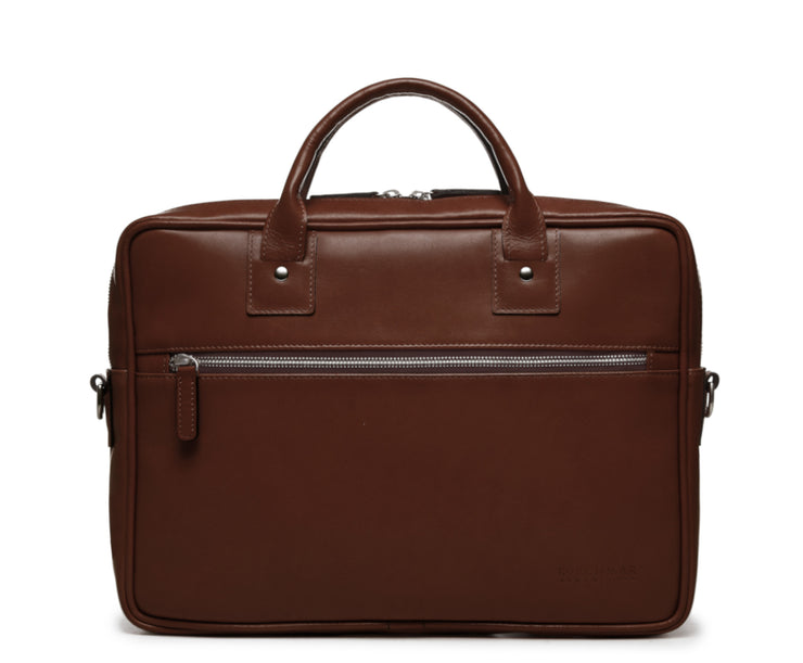 Brown Slim Leather Briefcase The Edwin leather briefcase features a removable, adjustable shoulder strap and built-in laptop sleeve. It is designed with a secure top zipper, and can safely accommodate most 13" laptops.