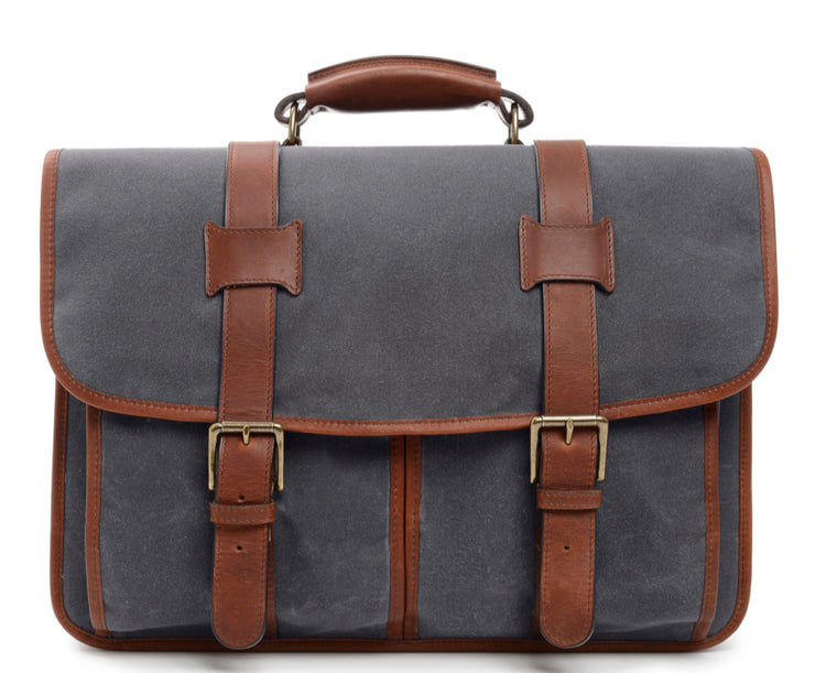 Grey Waxed Canvas Laptop Briefcase The Garfield is a professional messenger style briefcase that is constructed with water-resistant waxed canvas and includes a removable, adjustable leather shoulder strap. The Garfield can accommodate most 15" laptops.