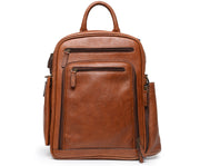 Brown Leather Commuter Backpack The Graham commuter backpack brings modern features and functionality to a classic design. Handcrafted with American full-grain leather, this meticulously appointed backpack offers extensive organizational capacity in a sleek, compact silhouette. The Graham features nine convenient exterior pockets, two of which offer easy access to a water bottle, sunglasses, or other on-the-go items. The Graham commuter backpack is designed to accommodate most 15” laptops.