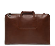 Brown Full grain mill dyed American leather exterior and interior Telescoping handles allow for easy access to interior easy underarm carry Cell phone, tablet, pen and notebook pockets Solid Brass hardware in matte nickel finish Full length solid brass polished tooth zipper allowing lay flat use Adjustable, removable shoulder strap Handcrafted in our own factory Removable, padded computer sleeve designed for most 15" laptops Dimensions: 17" x 3" x 11.5"