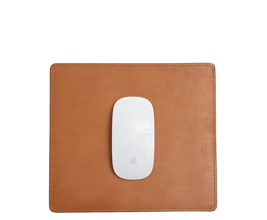 Tan Full-grain American leather Backed with non-skid durable rubber mat Each mouse pad's selection is one-of-a-kind and slightly unique given the natural characteristics of the leather Handcrafted with care in our own factory Dimensions: 9" H x 8" W #color_tan