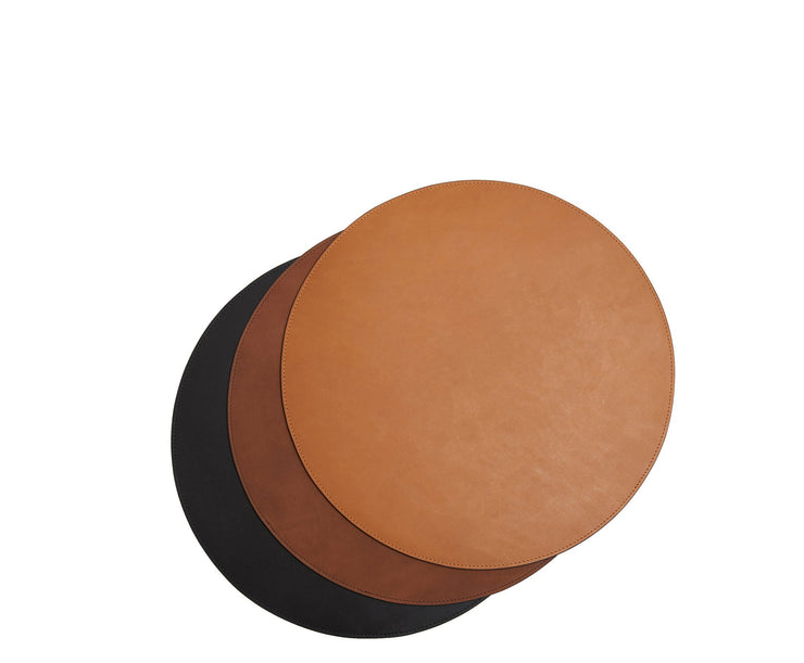 Black Full-grain American leather Backed with non-skid durable rubber mat Each placemat's selection is one-of-a-kind and slightly unique given the natural characteristics of the leather Handcrafted with care in our own factory Dimensions: 15" D