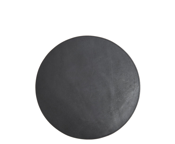 Black Leather circular placemat Add richness and depth to your dining table with the Nelson leather placemat. The Nelson is handcrafted with American full-grain leather and is backed with a non-skid durable rubber mat.