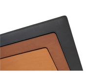 Tan Full-grain American leather Backed with non-skid durable rubber mat Each placemat's selection is one-of-a-kind and slightly unique given the natural characteristics of the leather Handcrafted with care in our own factory Dimensions: 18" W x 12" H