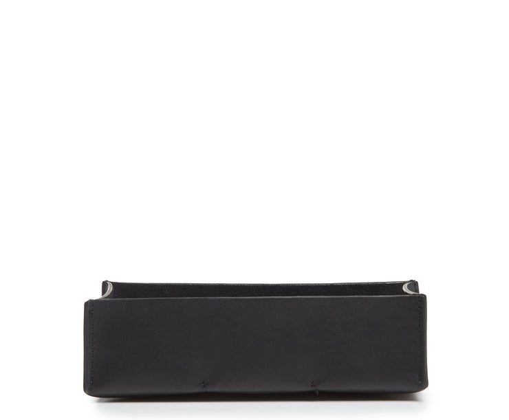 Black Leather desk tray Keep your pencils, pens and other small office essentials organized and easily at reach with the Litton leather pencil tray. The Litton is handcrafted with top-quality full-grain American leather and uses whip-stitches to help form a secure flat base.