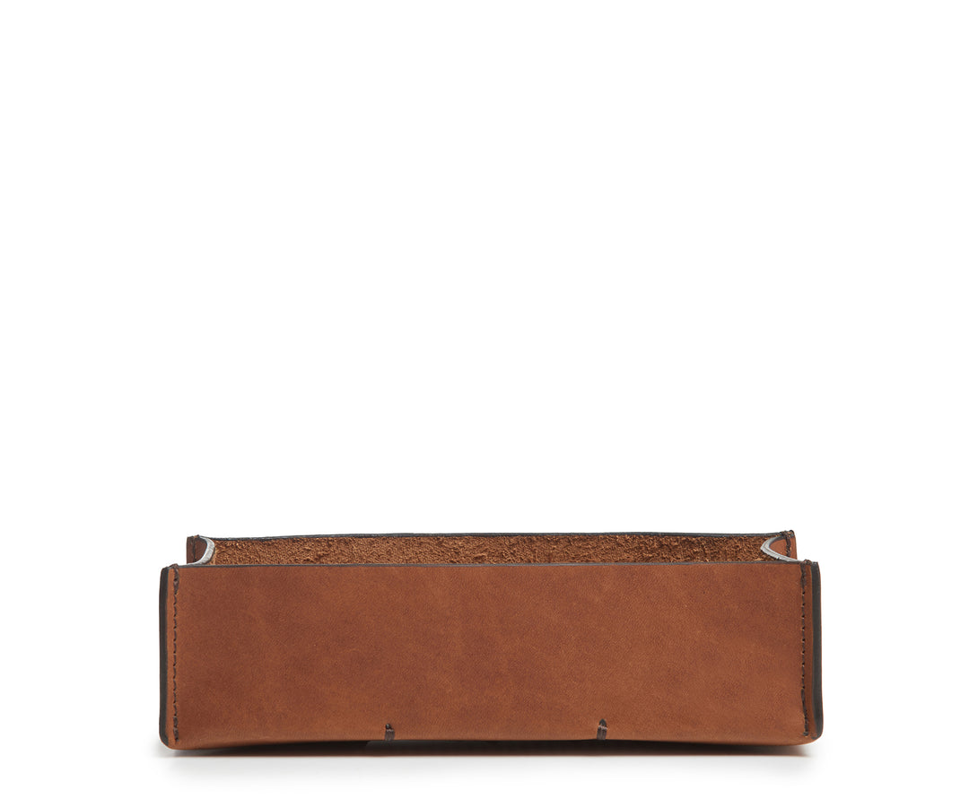 Espresso Leather desk tray Keep your pencils, pens and other small office essentials organized and easily at reach with the Litton leather pencil tray. The Litton is handcrafted with top-quality full-grain American leather and uses whip-stitches to help form a secure flat base. #color_espresso
