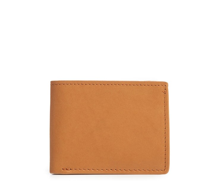 Tan Slim leather wallet The York leather billfold is handcrafted with American full-grain leather and offers a slim minimalist profile. With six scalloped credit card pockets and a vertical stash pocket, the York is perfect for traveling light while keeping your cards and cash secure.