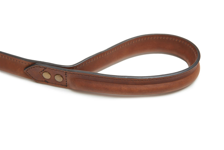 Espresso Full-grain American leather Solid brass swivel snap Handcrafted with care in our own factory Dimensions: 5' L x 1" W