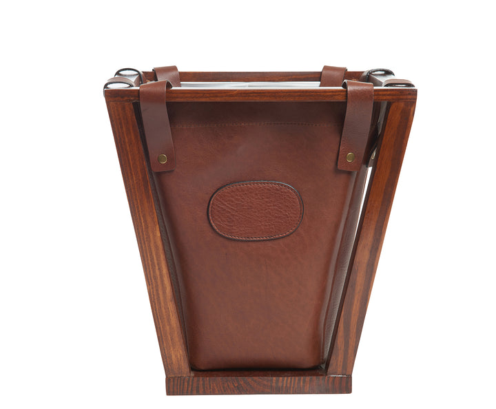 Chocolate Full-grain American leather Strong pine wood frame construction Removable, easy to clean liner 4-gallon capacity Each waste basket's selection is one-of-a-kind and slightly unique given the natural characteristics of the leather Handcrafted with care in our own factory Dimensions: 12" W x 12.25" H (base measures 7.5" W)