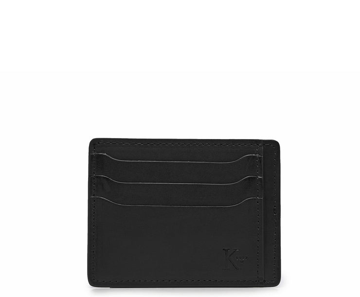 Black Slim leather wallet Handcrafted with full-grain vegetable tanned leather, this slim wallet is designed with simplicity and functionality in mind. Made to slip easily into back pockets, the Knox has six scalloped credit card slots and two vertical stash pockets.