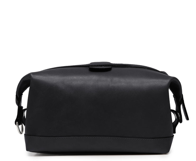 Black Full grain American leather Antique nickel hardware Snap down ends, which allow for expansion Fully lined with signature 6.4 oz yarn dyed twill Zipper length of 13.25" Handcrafted with care in our own factory Dimensions: 11" x 5" x 6"