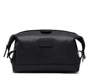 Black Leather Dopp Kit The Ryder dopp kit in Korchmar's Classic Leather is made of American cowhide leather that is selected from the top 5% of available hides. Colored only with aniline dyes, this leather retains its natural beauty over time and features visible markings that are characteristic of only the finest leather. The Ryder features a top zipper and snap down ends that allow for maximum expansion.