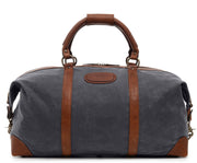 Grey 22" Waxed Canvas Weekender One of our best-selling weekender styles, the waxed canvas Twain is ideal for leisure or business travel. At 22", it is designed to fit comfortably in most airline overhead compartments. The Twain waxed canvas duffel bag is handcrafted with water-resistant waxed canvas and includes a removable, adjustable leather shoulder strap.