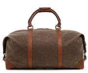 Olive One of our best-selling weekender styles, the waxed canvas Twain is ideal for leisure or business travel. At 22", it is designed to fit comfortably in most airline overhead compartments. The Twain waxed canvas duffel bag is handcrafted with water-resistant waxed canvas and includes a removable, adjustable leather shoulder strap.