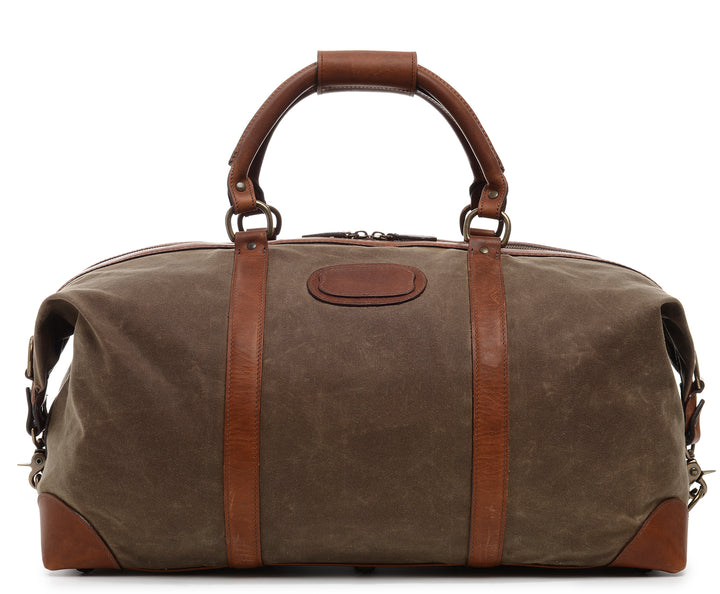 Olive 22" Waxed Canvas Weekender One of our best-selling weekender styles, the waxed canvas Twain is ideal for leisure or business travel. At 22", it is designed to fit comfortably in most airline overhead compartments. The Twain waxed canvas duffel bag is handcrafted with water-resistant waxed canvas and includes a removable, adjustable leather shoulder strap.