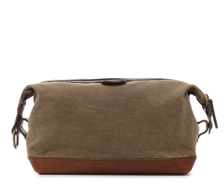 Olive Waxed canvas with full grain American leather trim Antique brass hardware Snap down ends, which allow for expansion Fully lined with signature 6.4 oz yarn dyed twill Zipper length of 13.25" Handcrafted with care in our own factory Dimensions: 11" x 5" x 6"