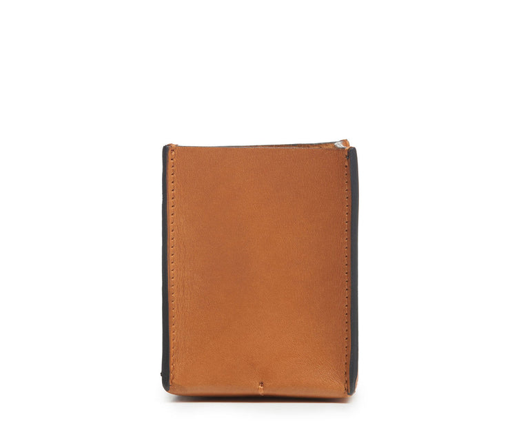 Tan Leather pencil cup A simple but elegant addition to your desk setup, the Leland leather pencil cup helps keep your pencils, pens and other small office essentials organized. The Leland is handcrafted with top-quality full-grain American leather and uses whip-stitches to help form a secure flat base.