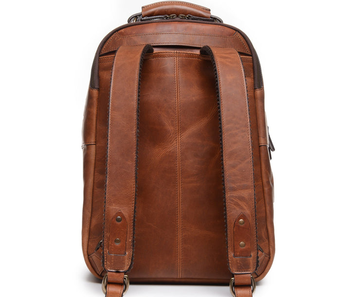 Espresso Keychain attachment Interior organizer panel Fits up to a 15" laptop Strap designed for easy carry on telescoping luggage handles Handcrafted with care in our own factory Natural leather lining Dimensions: 17" x 7" x 12"