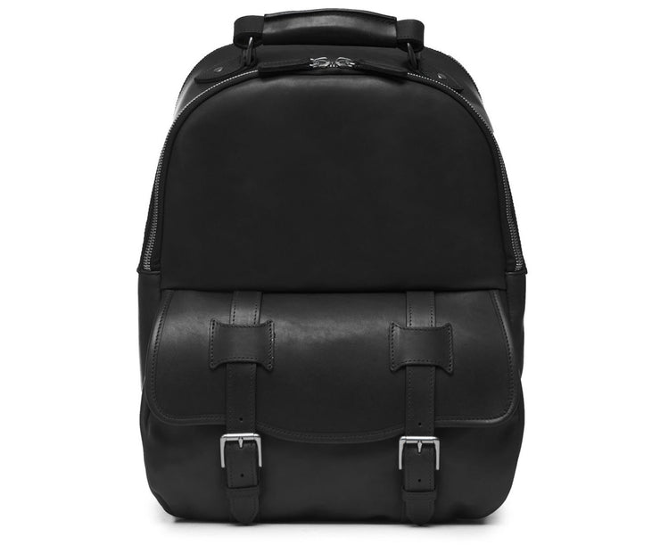 Black Classic Leather Backpack The Lewis in Korchmar's Classic Leather is made of American cowhide leather that is selected from the top 5% of available hides. Colored only with aniline dyes, this leather retains its natural beauty over time and features visible markings that are characteristic of only the finest leather. A classic backpack silhouette, the Lewis is designed with both daily commutes and weekend excursions in mind.