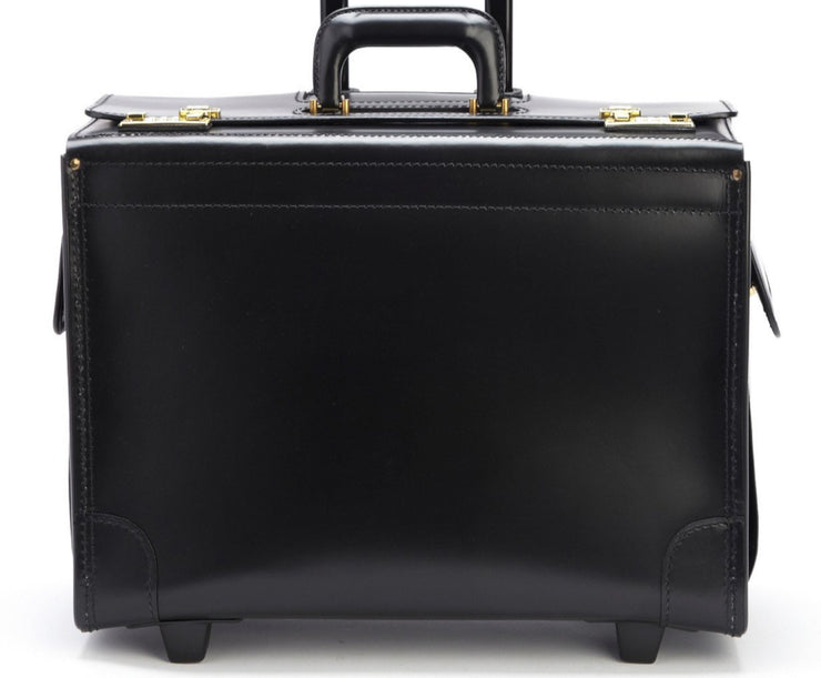 Black Top-grain American leather Extruded T-Rail protective bumper edge Riveted heavy gauge USA cold rolled strip steel frame Two full-length expanding partitions Wrap around protective corners Protective bottom studs Business organizer beneath lid Includes strap key hook and deluxe luggage tag