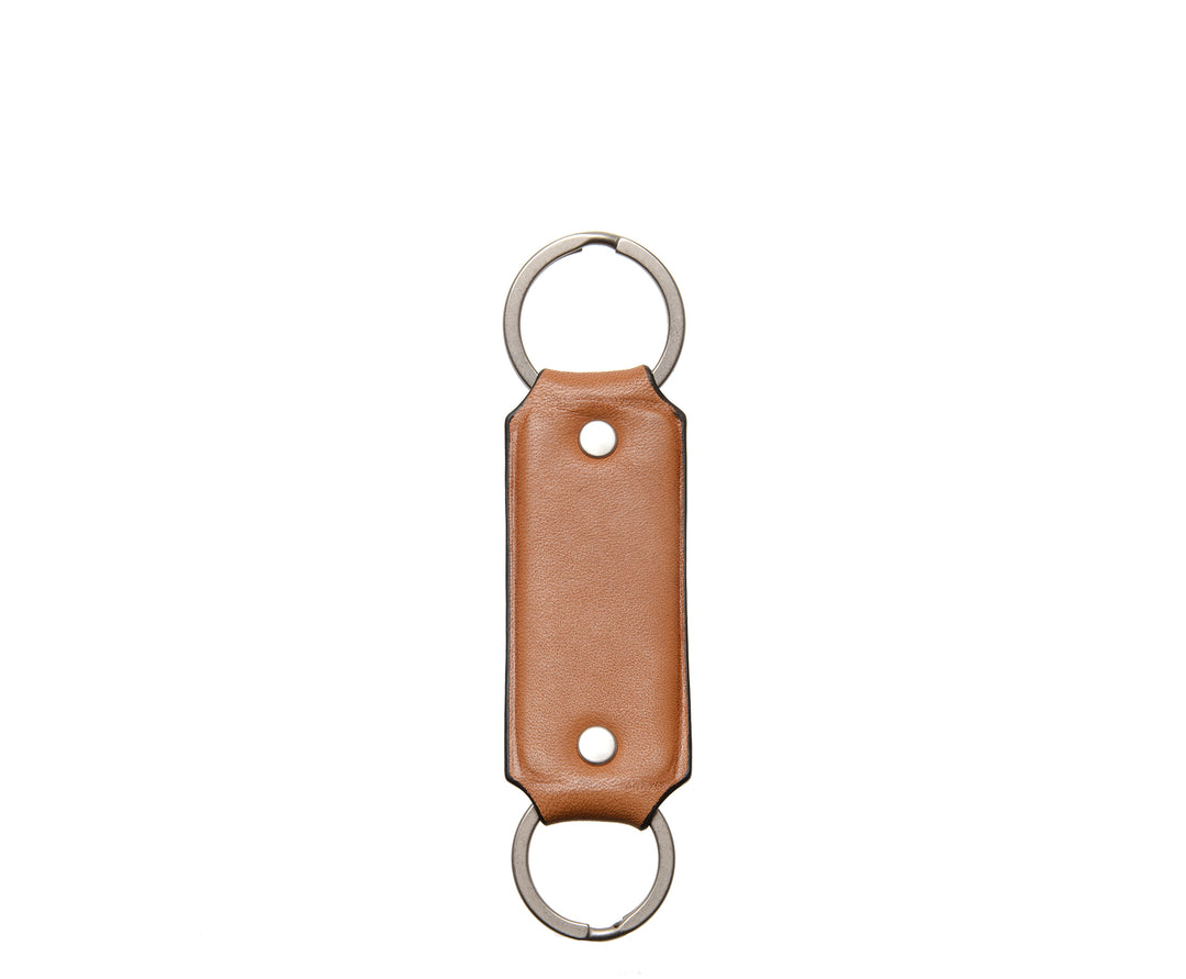 Tan Hover Full grain mill dyed American leather Steel key rings Handcrafted with care in our own factory Dimensions: 5" x 1.25" #color_tan
