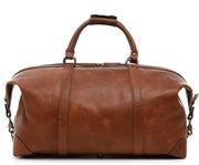Espresso One of our best-selling weekender styles, the Twain is ideal for leisure or business travel. At 22", it is designed to fit comfortably in most airline overhead compartments. The Twain leather duffel bag is handcrafted in the USA with full grain leather that develops a beautiful patina with time. It includes a removable, adjustable shoulder strap.